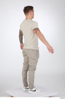 Gilbert a-pose beige t-shirt beige trousers casual dressed standing white…